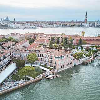 Aerial view of Belmond Hotel Cipriani, with St Mark's square in the distance
