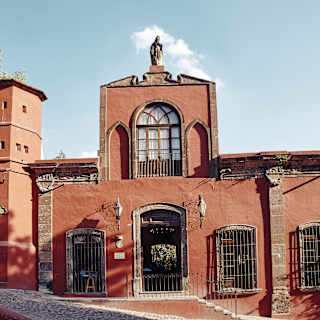 The ancient façade of Casa Parque, just one of the heritage buildings forming Casa de Sierra Nevada