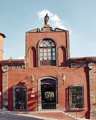 The ancient façade of Casa Parque, just one of the heritage buildings forming Casa de Sierra Nevada