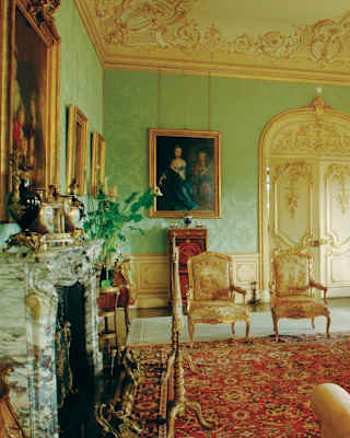 The drawing room of the Downton Abbey location, Highclere Castle, lavishly decorated with acres of gilt and giant chandelier