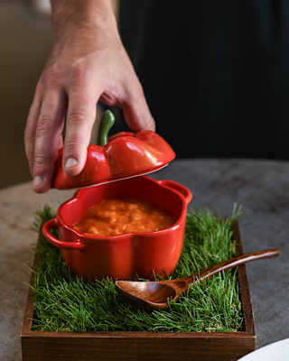 Alessandro Cozzolino’s bell pepper risotto is served in a dish shaped like a red pepper, the green stem forming part of the lid