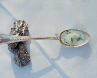 A taster of the classic Venetian dish, baccalà mantecato – creamed cod – sits on a silver spoon on a white table cloth