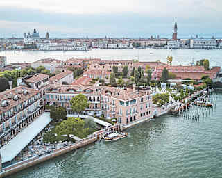 Aerial view of Belmond Hotel Cipriani, with St Mark's square in the distance