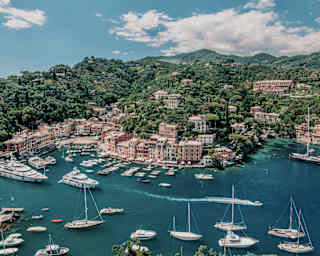 Aerial view of pastel coloured residences on the hills around Portofino