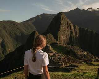 A guest arrives at the world-famous ruins of Machu Picchu's ancient Inca citadel