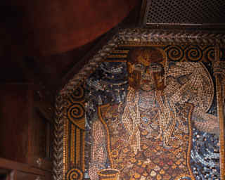 Close-up of a mosaic floor with a design of the Roman goddess Minerva
