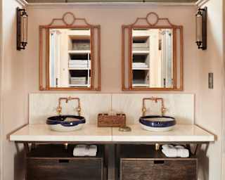 Elegant and practical, the twin-sink vanity unit of a luxury safari tent bathroom