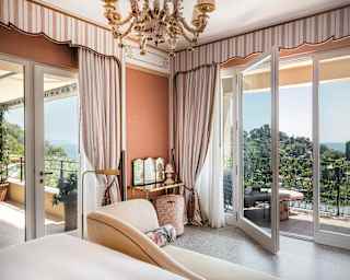 With peach and cream décor, the Baronessa Suite embraces Mediterranean warmth with large glass doors to a terrace and garden.