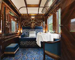 Arranged for day, with deep blue carpets and upholstered folding bed, Le Lac Suite reflects the drama and romance of water.