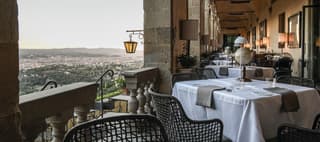 Formal restaurant in an open-air cloister with views over Florence