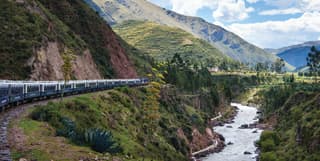 The Andean Explorer weaves through the verdant Andes en-route to Lake Titicaca, following the meandering Urubamba River.