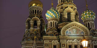 Ornate Russian orthodox church with brightly-coloured and gold-plated dome spires