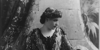 a vintage photograph of lillie langtry wearing a beaded gown