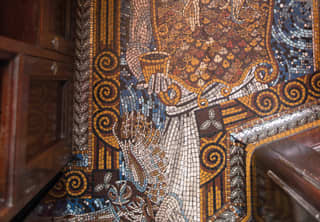 Close-up of a mosaic floor with a design of the Roman goddess Minerva