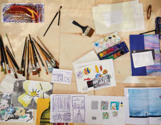 a selection of art tools and sketches