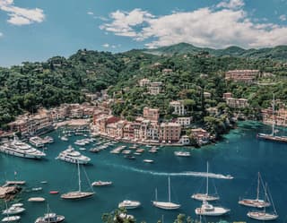 Aerial view of pastel coloured residences on the hills around Portofino