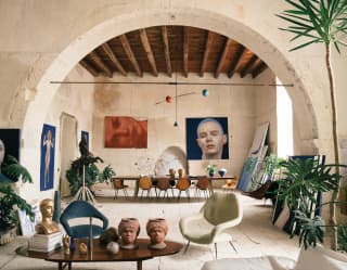 Sculptures of heads and paintings of faces and a body fill an atelier belonging to the late classical pianist Sergio Fiorentino