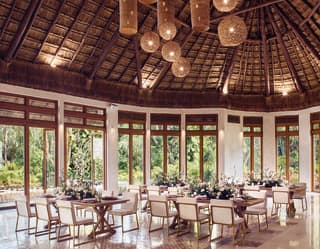 decorated tables in Palapa room