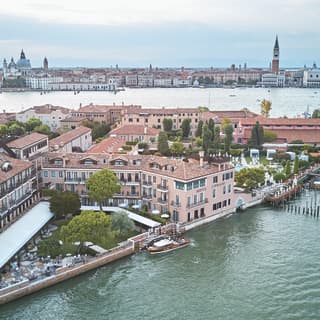 Aerial view of Belmond Hotel Cipriani, with St Mark's square in the distance
