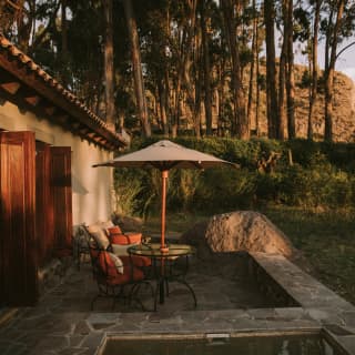 La Casita With Valley View's table, chairs and parasol on the terrace