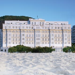 Vast art-deco hotel across a powdery white beach