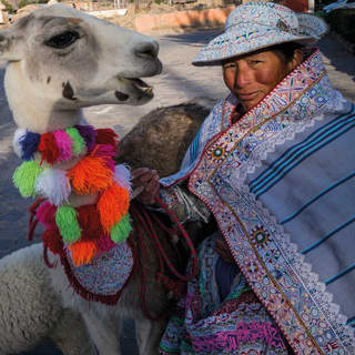 Local woman and alpaca