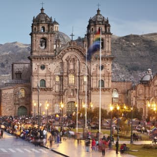 Ornate Spanish colonial church at sundown in Cusco
