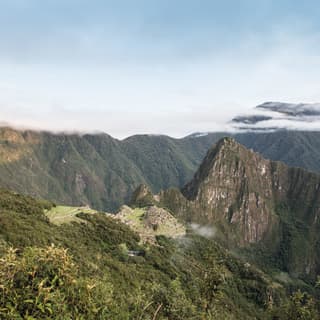 Aerial view of Machu Picchu landscape and jungle coated mountains