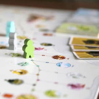 Experience the lure of the grand cities of Europe in the acclaimed board game of Tokaido