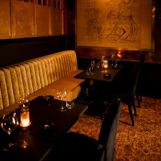 Red Room offers sultry dining with candle-lit black tables, a gold velvet banquette, red carpet and a spot-lit bamboo screen.