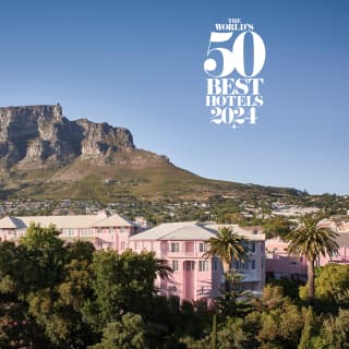 The World's Best Hotels 2024 white text accompanies an image of Mount Nelson Hotel with a dramatic Table Mountain backdrop.