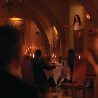 Famous Peruvian soprano singer, Angela Medina performs from a raised arch in the candle-lit ambience of El Tupay restaurant.