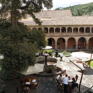 Aerial view of Monasterio and garden courtyards in Cusco