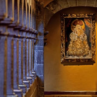 Original religious artwork in one of the old monastery’s atmospheric stone corridors