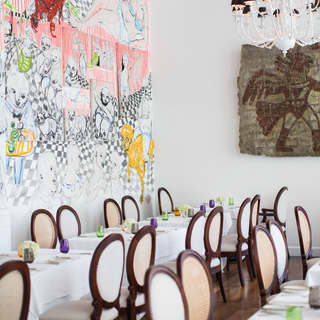 The restaurant shows how cutting edge modern artworks decorate walls throughout the hotel