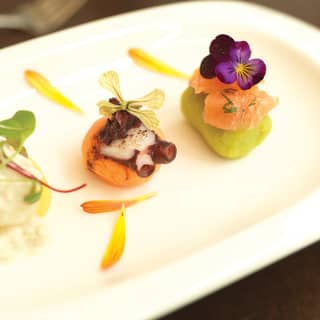 The finest nibbles prepared by Restaurant Tampu feature fresh local ingredients including colourful edible flowers