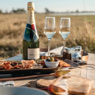 A luxurious champagne picnic for guests in Botswana’s Okavango Delta
