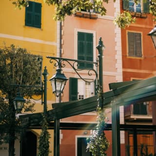 Portofino architecture with wrought iron lanterns in the foreground