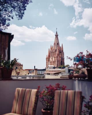 View from a junior suite terrace of church spires in the San Miguel skyline