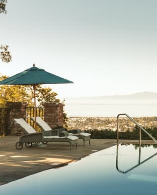 The hotel’s infinity edge swimming pool enhances the sunny views across Santa Barbara to the ocean beyond