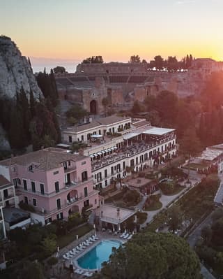 Aerial view of Grand Hotel Timeo at sunset
