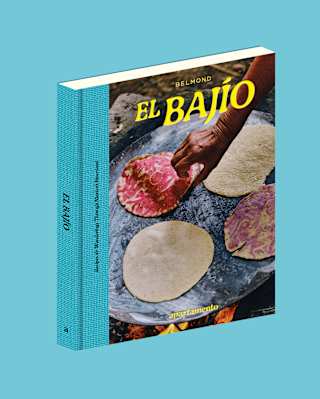 The El Bajío cookbook with a cover photo of four tortillas on a hotplate, two with cochineal patterns, on a blue background.