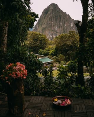View of Machu Picchu mountain through Hotel's garden 