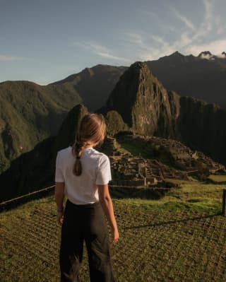 A guest arrives at the world-famous ruins of Machu Picchu's ancient Inca citadel