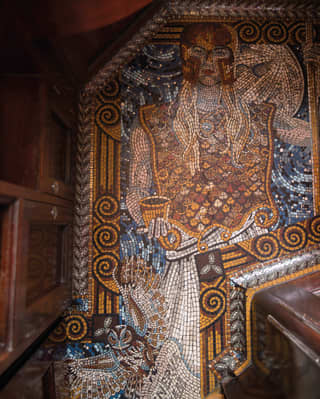 Close-up of a mosaic floor with a design of the Roman goddess Minerva