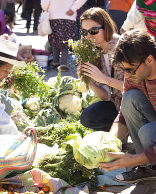 A local market gives hotel guests a chance to meet the people and produce of the real Peru