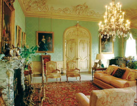 The drawing room of the Downton Abbey location, Highclere Castle, lavishly decorated with acres of gilt and giant chandelier