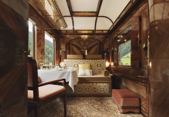 With walnut panelling, russet velvet seats and a carpet in swirling mushroom shades, La Forêt Suite glows with warm  tones.