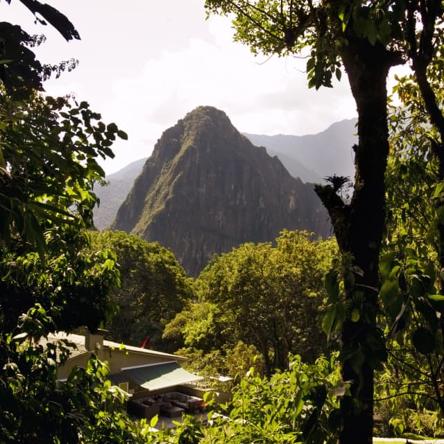 Belmond Sanctuary Lodge - Hotel in Machu Picchu, Peru. Views of the  mountain Huayna Picchu (Young Mountain) from the Machu Picch Stock Photo -  Alamy