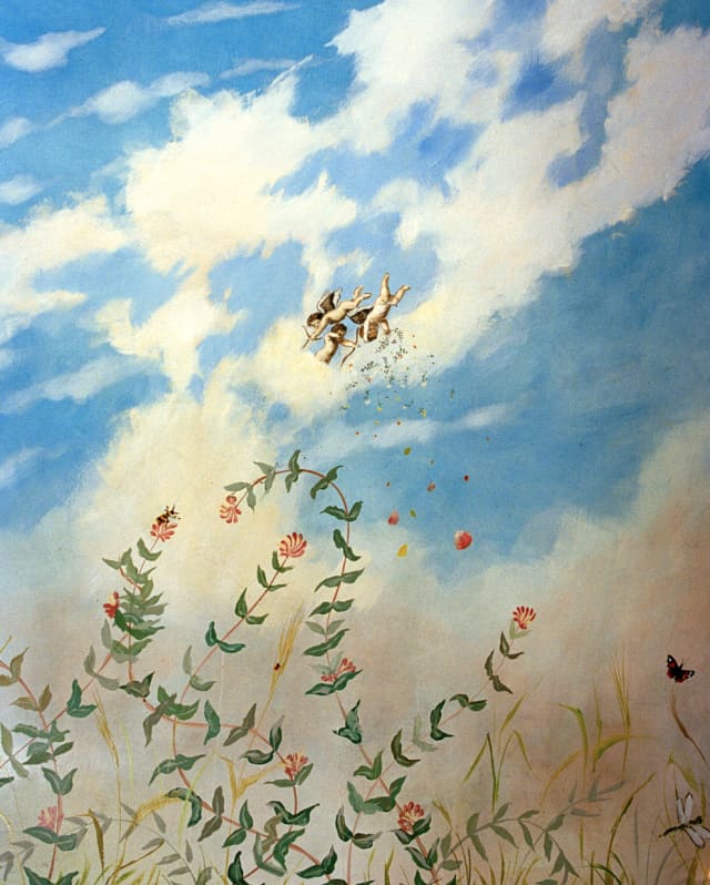 Three cherubim play in a cloud sky above wildflowers in a fresco painted by Ian Harper on the ceiling of the flower hut.
